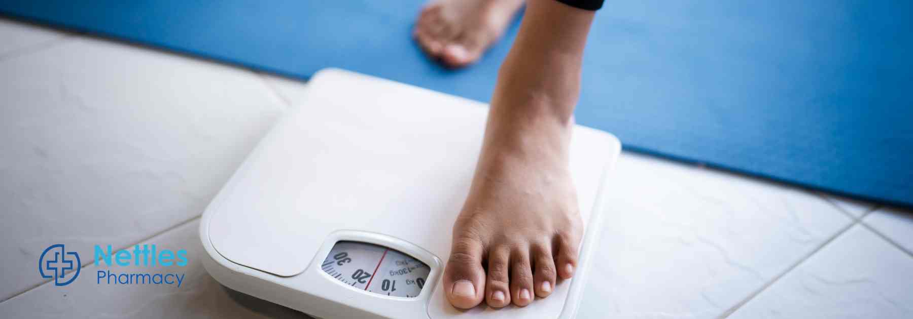 Stepping onto a weighing scale
